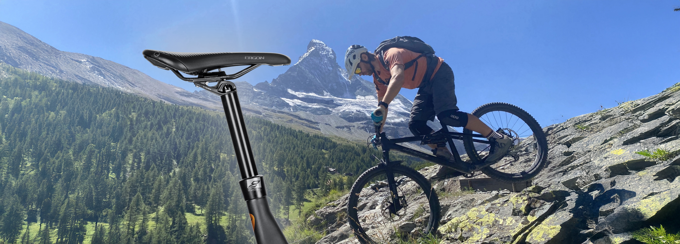 Biker auf technischen Trail vor dem Matterhorn auf einem Liteville Bike mit integrierter Eightpins Sattelstütze.